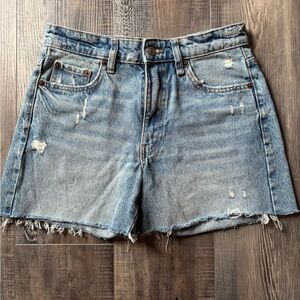 Classic High-Rise Light Blue Denim Shorts with Frayed Hem